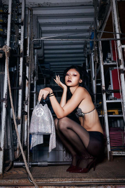 THE CRYSTAL POPPI BUCKET BAG IN STARDUST SILVER