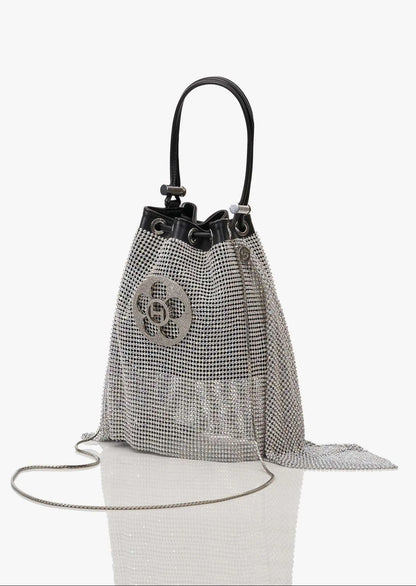 THE CRYSTAL POPPI BUCKET BAG IN STARDUST SILVER