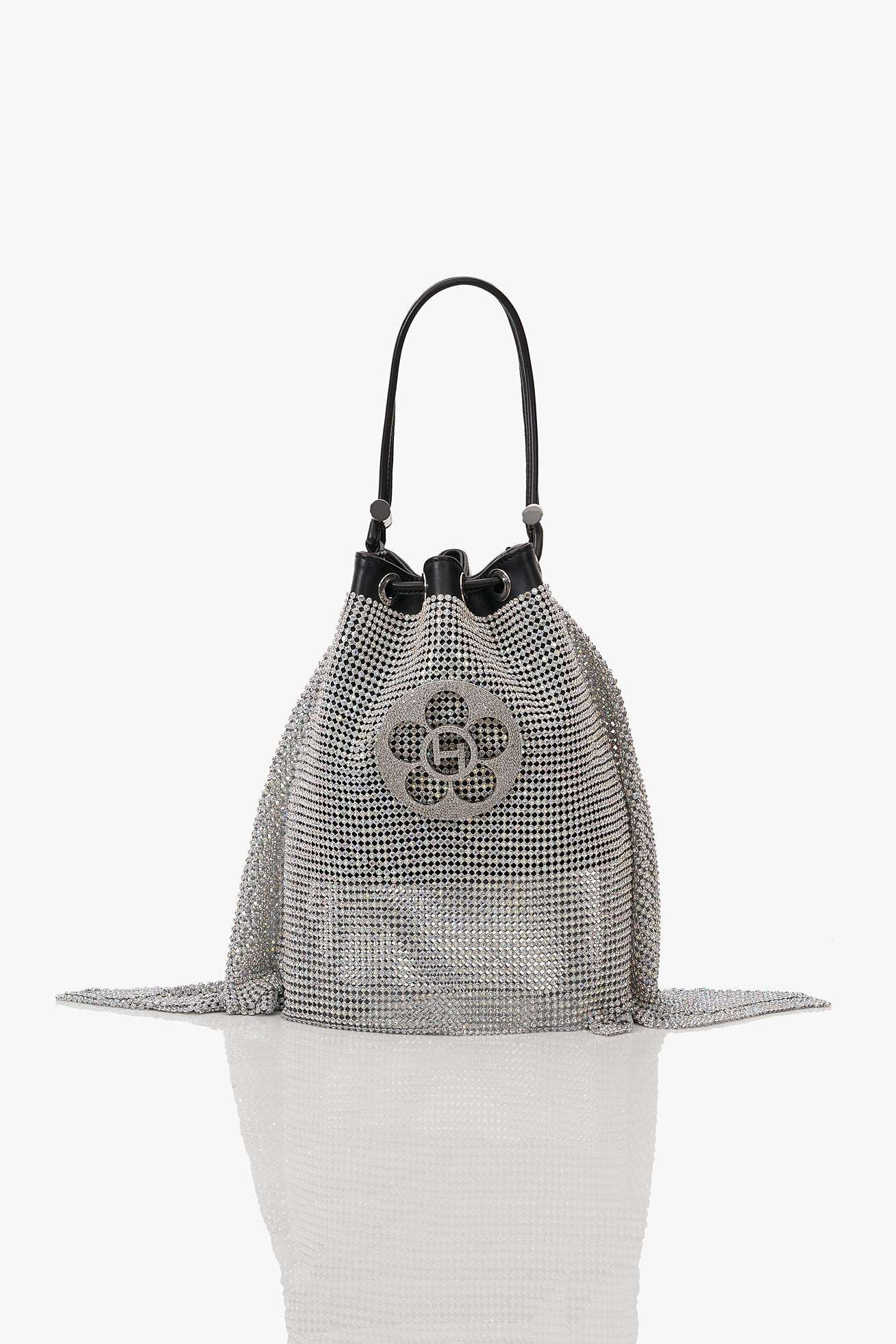 THE CRYSTAL POPPI BUCKET BAG IN STARDUST SILVER